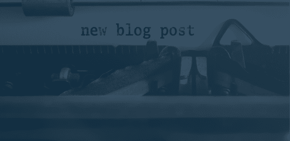 typewriter typing out the words new blog post